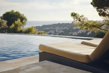 Obraz premium Luxury poolside retreat overlooking scenic hills and ocean views