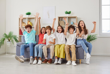 Euphoric school team cry, children group in common joy, pre-teens, teenagers diverse friends, enjoy...