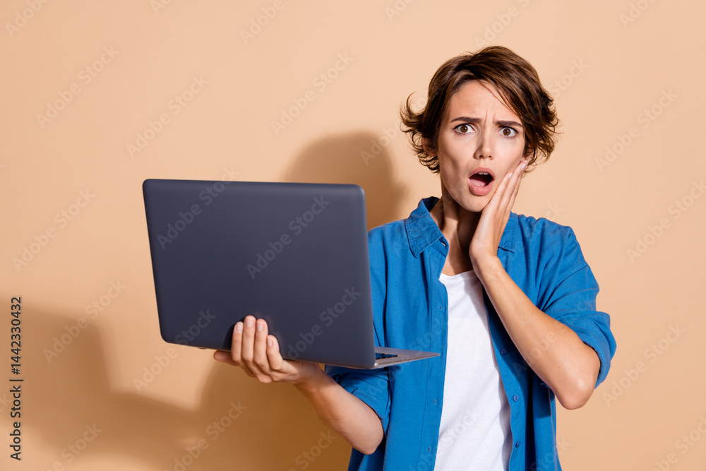 Aufkleber Photo of hr manager touch cheek with netbook realizing her applicant telling disinformation in cv isolated on beige color background