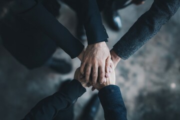 Corporate partners shaking hands in the office, representing unity and mutual support