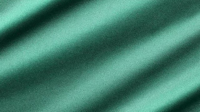 Green sports clothing fabric football shirt jersey texture close up