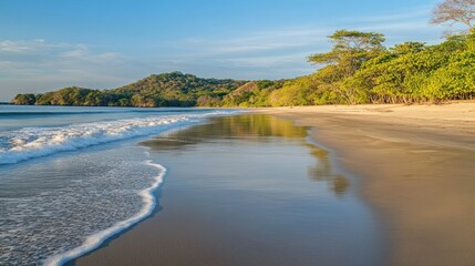 Scenic beach landscape featuring a sandy shore and gentle waves