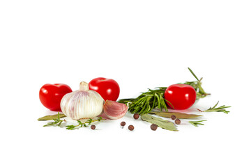 Rosemary, tomatoes, garlic and spices isolated on white background.
