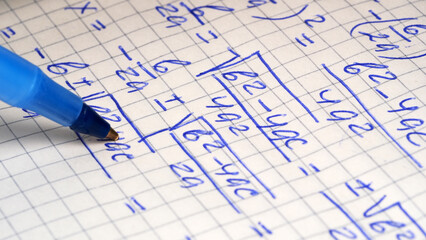 Solving math with bold blue ink