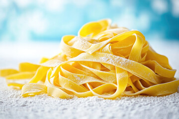 Pile of raw tagliatelle pasta rests on a floured surface, highlighting its golden texture and freshness representing  traditional italian cooking, and homemade food. 