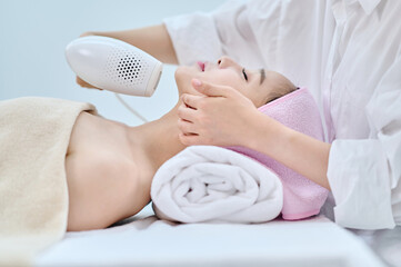 Female Facial Laser Treatment in Spa