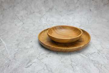 Empty Wooden Bowls on Marble Background