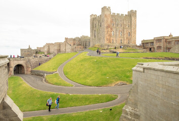 Bamburgh castle grounds - the inhabited keep and battery gate. Northumberland, England, UK (May 2017)