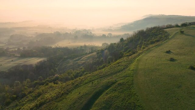 High-quality aerial footage over South Downs National Park, showcasing Ditchling Beacon. Perfect for tourism campaigns, travel promotions, and outdoor adventure marketing.