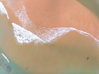 Aerial view of sandbar with sea water surface seascape background,Pink sand beach, Amazing summer background and holiday concept
