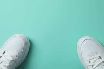 White sneakers on a color background