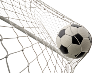 Soccer ball hits net during match in bright daylight hours