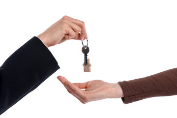 Real estate agent giving house key to new owner on white background, closeup