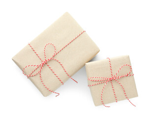 Two gift boxes wrapped in kraft paper isolated on white, top view
