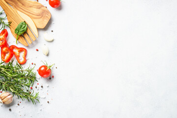 Cooking background with herbs, spices and vegetables.