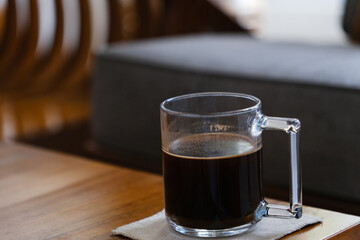 A cup of black coffee in glass
