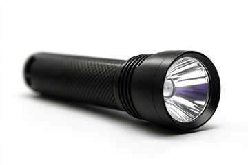 Black flashlight on a table