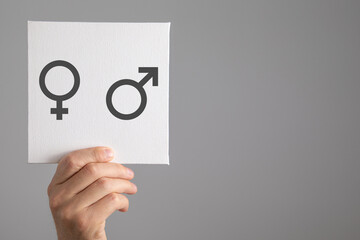 Man showing male and female gender symbols.