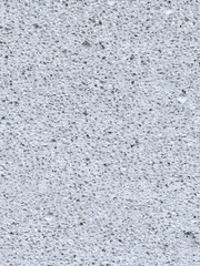 Close-up of a rough gray concrete surface