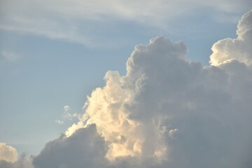 white and dark rain cloud floating on sky in evening
