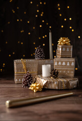 A captivating holiday scene featuring beautifully wrapped gifts with elegant gold bows, festive pine cones, and a glowing candle, evoking warmth and cheer.