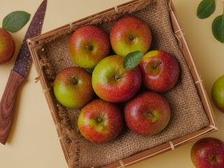 Fresh green red apple on bamboo plate. Apel malang, apel manalagi, wild apple, fruit. Malus sylvestris