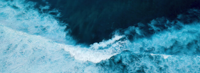 Banner Turquoise ocean sea water white wave pattern splashing deep blue sea. Banner Tropical sea...