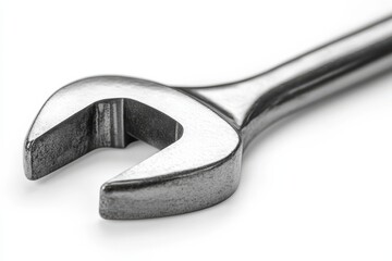 A wrench on a white surface