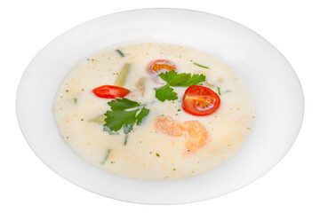 Creamy soup with shrimps and tomatoes. Isolated over white background