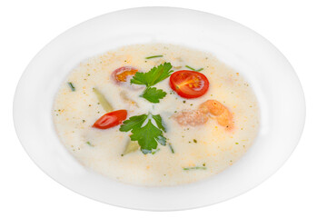 Creamy soup with shrimps and tomatoes. Isolated over white background