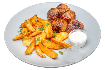 Meatballs with potatoes and sauce on a plate. Isolated over white background