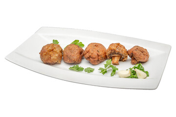 grilled championsedit with parsley and garlic on a white plate. Isolated