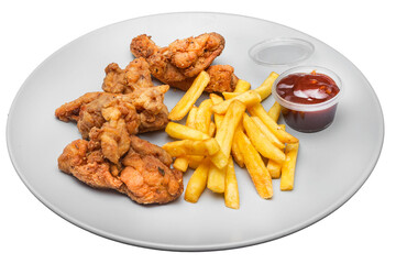 Fried chicken wings with french fries and ketchup. Isolated over white background