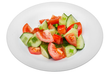Salad with cucumbers and tomatoes. Isolated over white background
