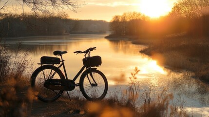 Bicycle by a lake at sunset