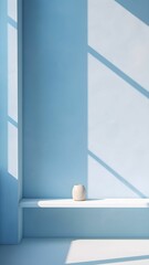 Minimal abstract light blue background for product presentation. Shadow and light from windows on plaster wall Photo