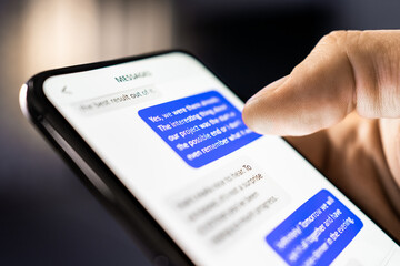 Text messages in phone. Texting mobile sms with friend on chat app. Business conversation. Scam or fraud with smartphone. Work discussion. Communication between students online.