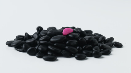 Be different concept. Unique Concept. Different color stone amongst black color stones