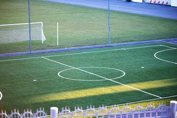 Obraz premium An empty football field. Gates, markings, empty stadium