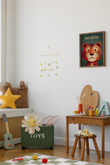 Children room corner featuring a green toy storage box, plush star pillow, daisy soft toy, and a warm palette — a playful and cozy corner for play and rest.