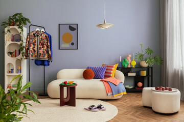 Modern and colorful interior of living room with design boucle sofa, mock up poster, shelf, plants,...