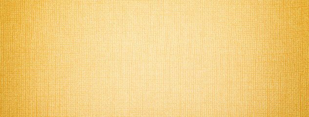 Light yellow background from textile material with wicker pattern and vignette. macro. Structure golden fabric