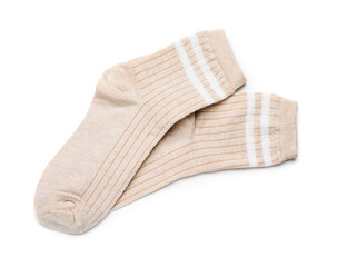 Pair of beige socks isolated on white, top view