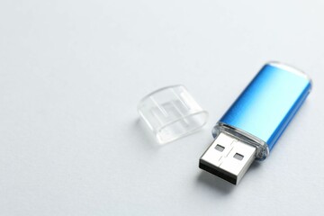 One flash drive on white background, closeup