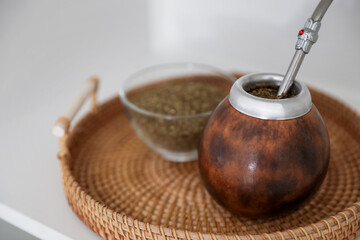 Traditional yerba mate tea on table, closeup