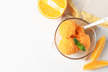 Tasty orange sorbet, fresh fruits and mint on white table, flat lay. Space for text