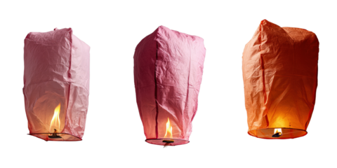 Colorful Floating Sky Lanterns in Different Shades Against Black Background