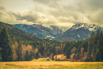 Spectacular Mountain Landscape of Kranjska Gora, Slovenia – Snow-Capped Peaks, Colorful Autumn Forests, and Tranquil Atmosphere
