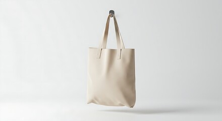 3D mockup of a tote bag hanging, isolated on white background
