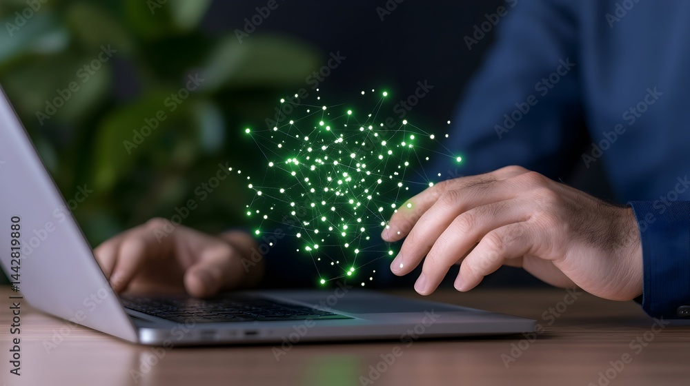 Poster person interacts with glowing green network data visualization hovering above a laptop